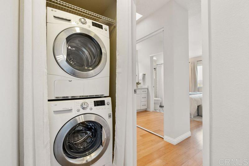 2118 Valleydale Lane Encinitas, CA 92024 - Photo 23 of 35 a view of a hallway with washer and dryer