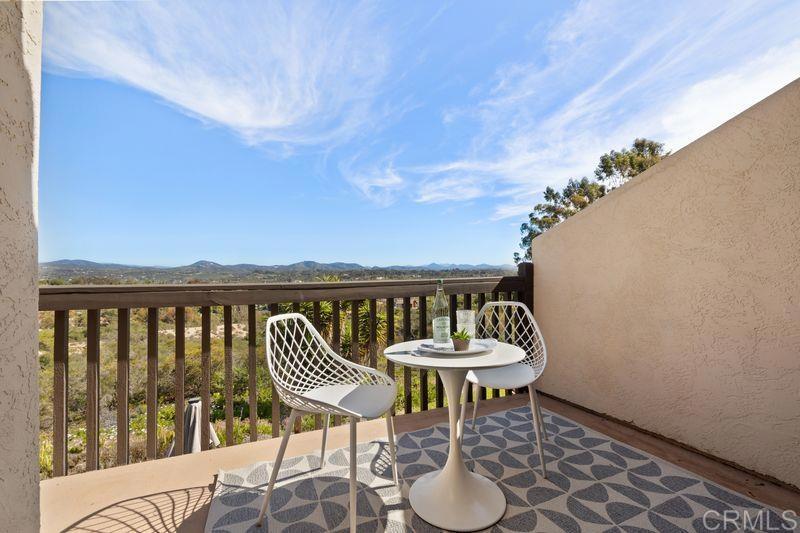2118 Valleydale Lane Encinitas, CA 92024 - Photo 25 of 35 a balcony with a table and chairs