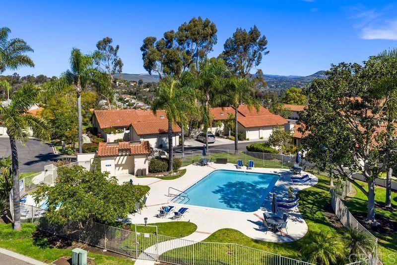 2118 Valleydale Lane Encinitas, CA 92024 - Photo 28 of 35 a view of a swimming pool with lounge chairs
