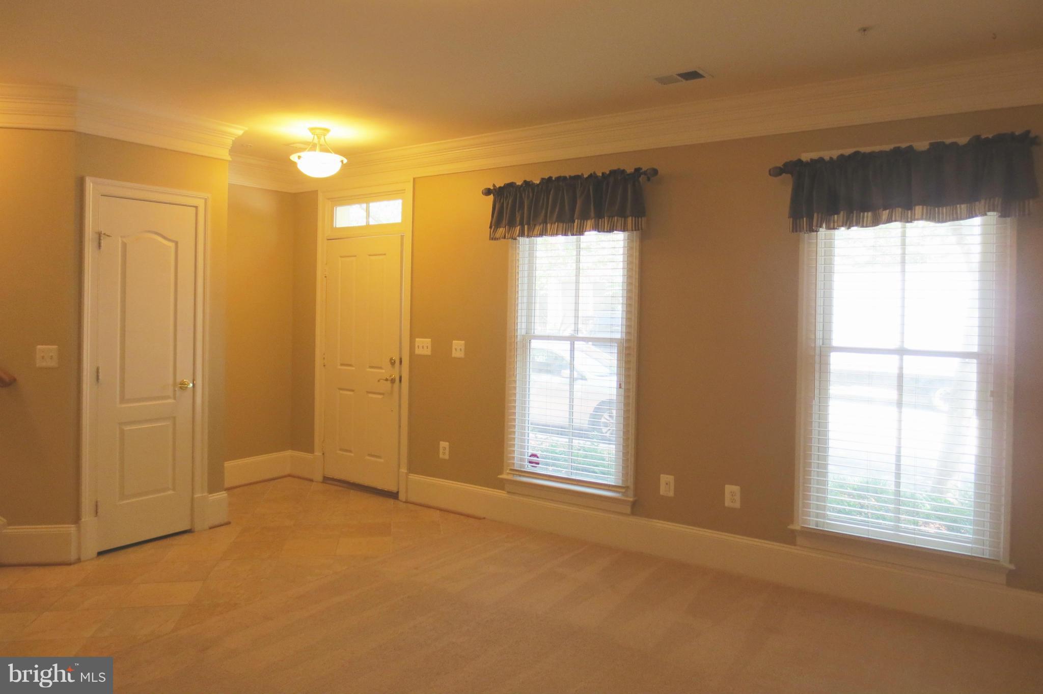 716 Carpenter Road Alexandria, VA 22314 - Photo 12 of 28 a view of an empty room with a window