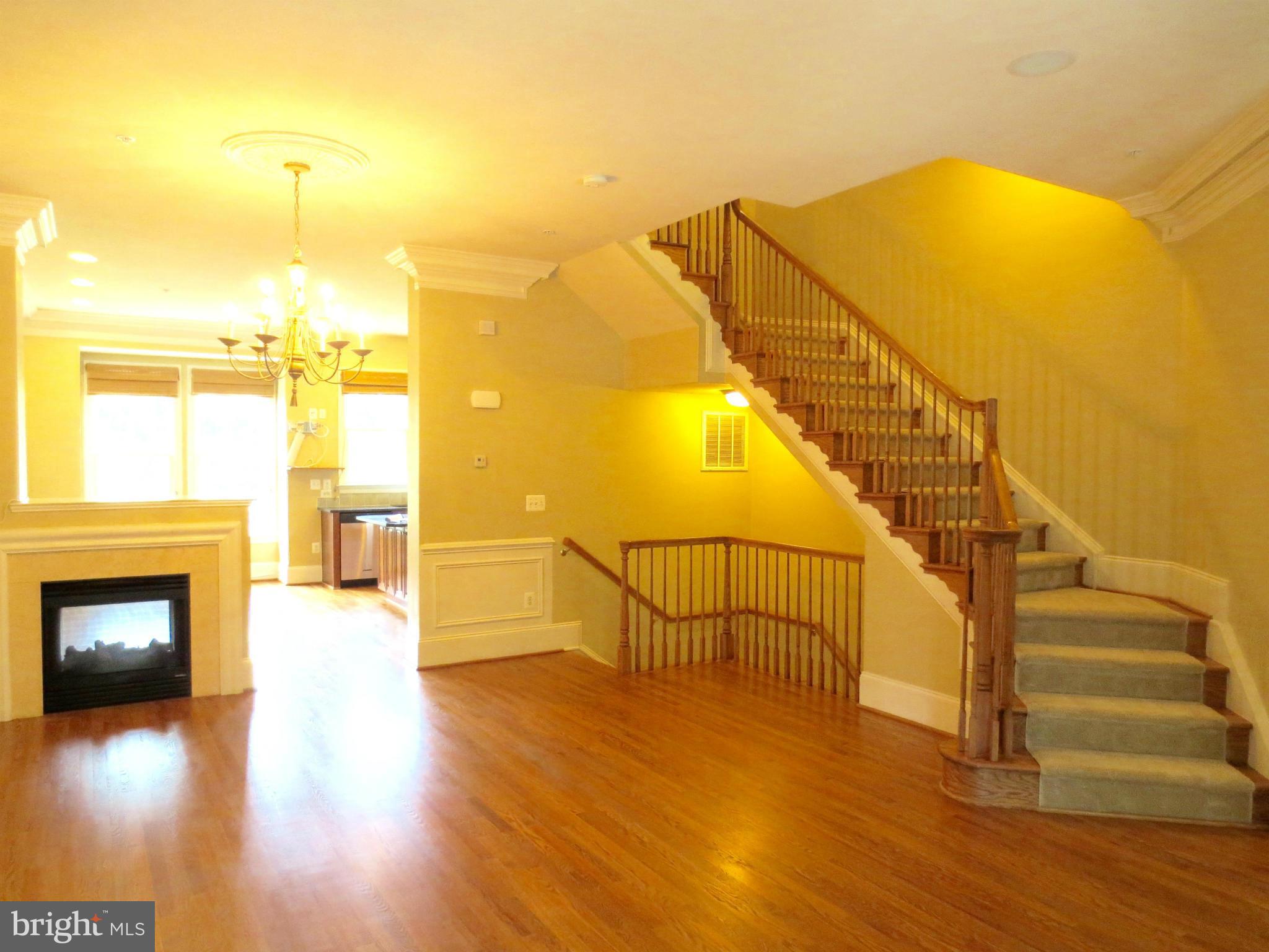 716 Carpenter Road Alexandria, VA 22314 - Photo 3 of 28 a view of entryway and hall with wooden floor