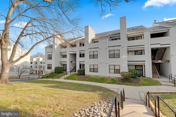 a view of building with yard