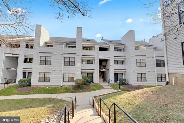 a front view of a building with street