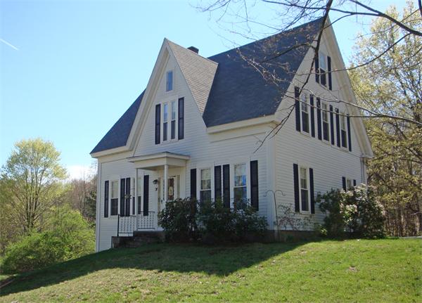 7 Jones Road Sutton, MA 01590 - Photo 1 of 1 a front view of a house with garden