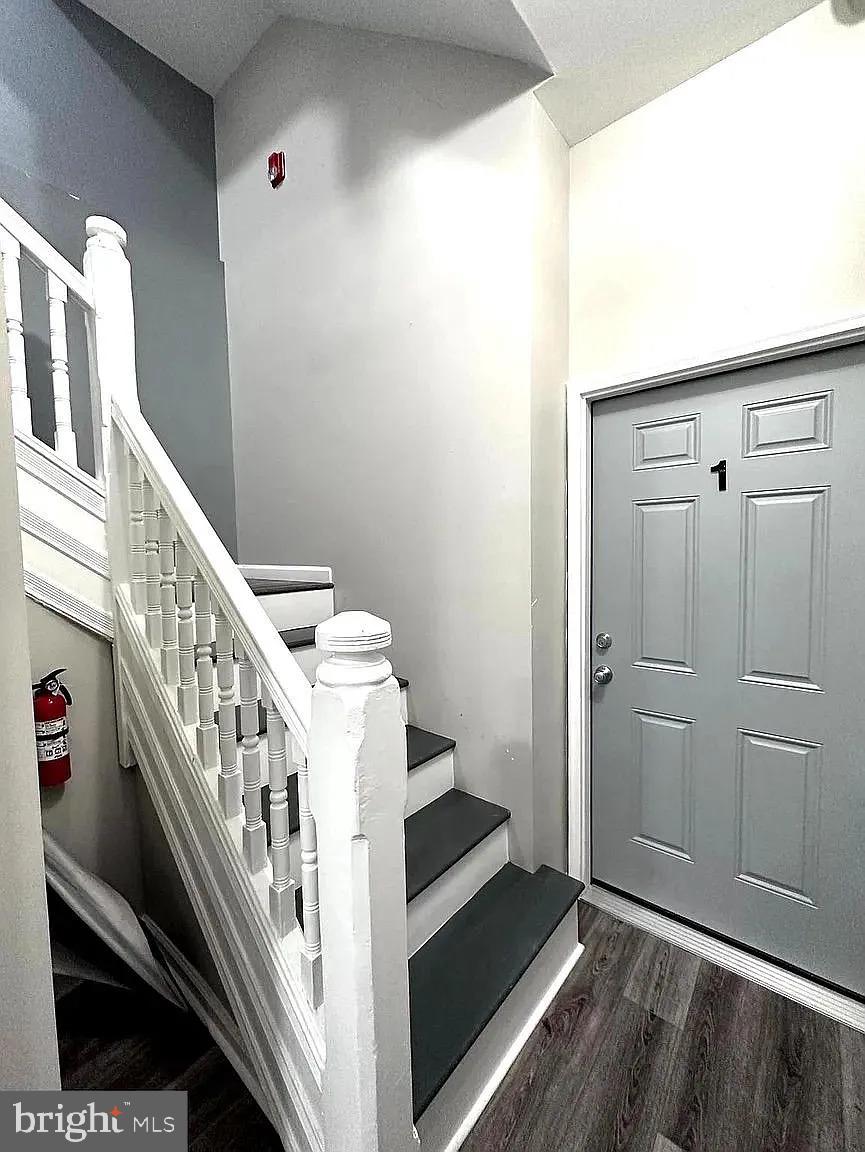 1721 McCulloh Street, Unit 3 Baltimore, MD 21217 - Photo 11 of 11 a view of an entryway with wooden floor