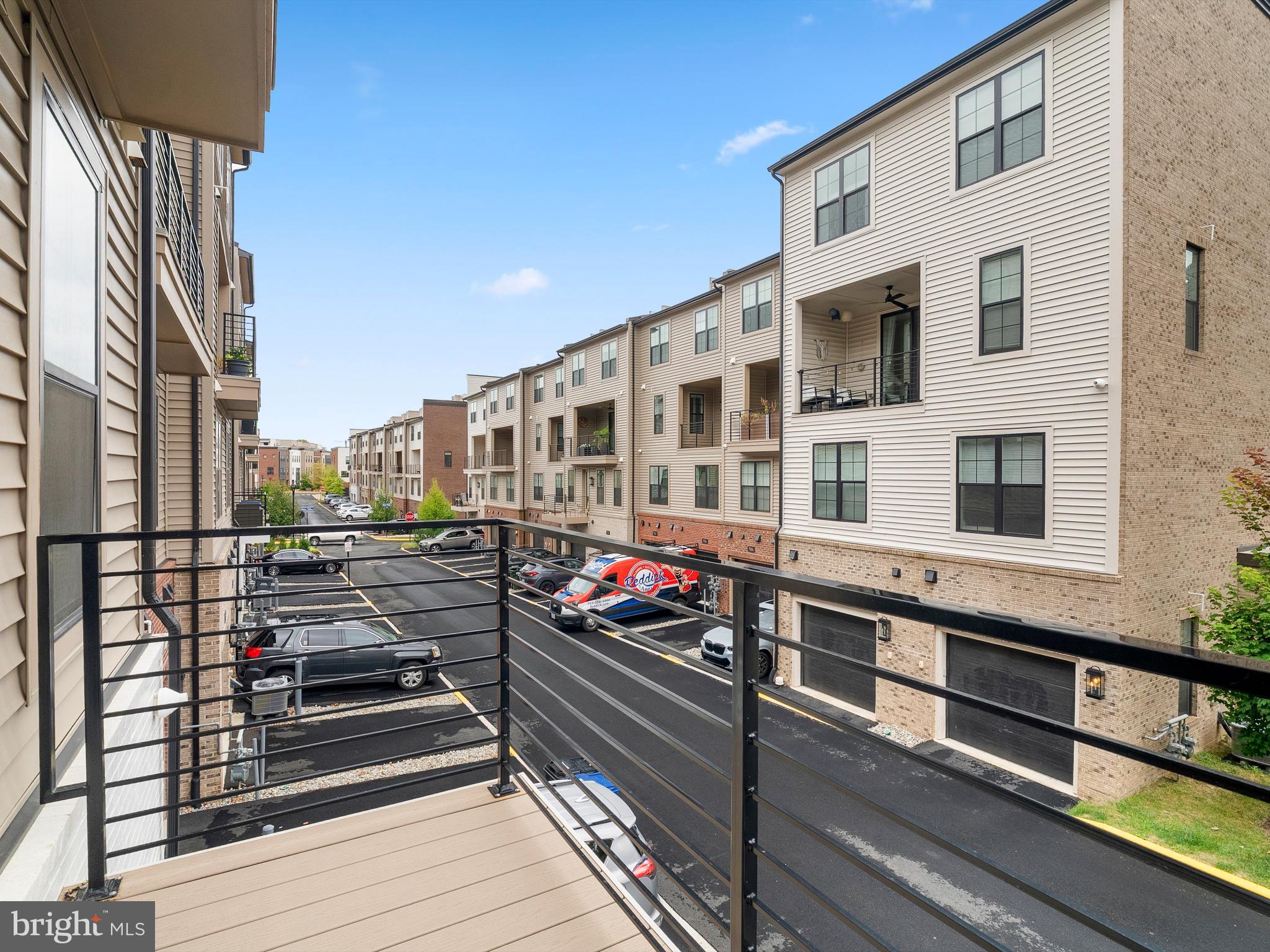7465 Backett Wood Terrace, Unit 1215 McLean, VA 22102 - Photo 19 of 23 a city view with tall buildings