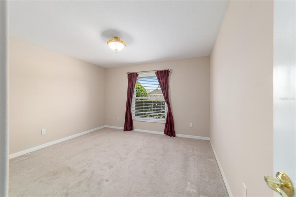 16369 Southwest 14th Avenue Road Ocala, FL 34473 - Photo 34 of 49 a view of an empty room with a window