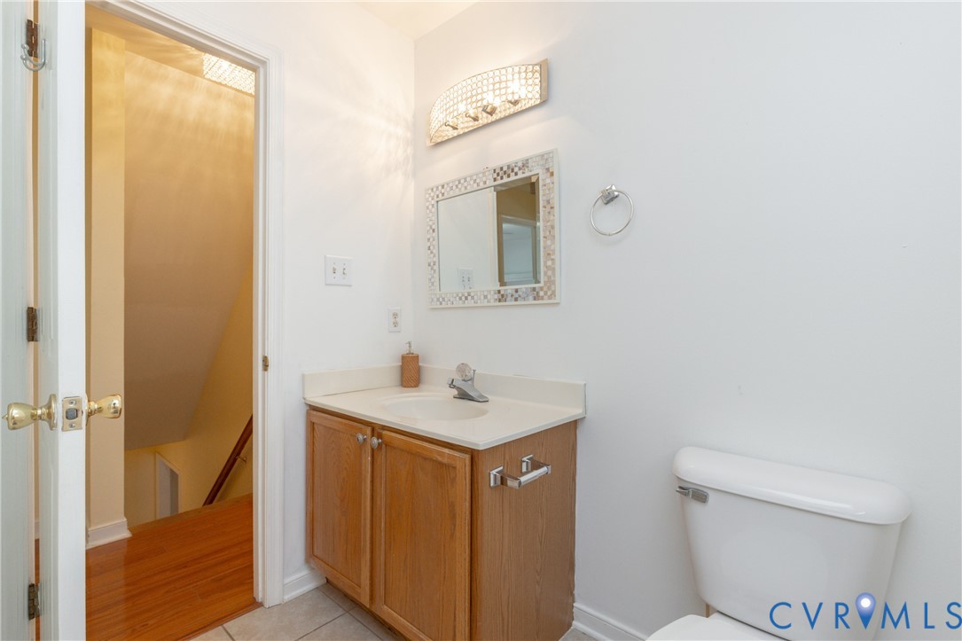 5101 Spring Bluff Road Midlothian, VA 23112 - Photo 38 of 47 Bathroom featuring a light wood-finish vanity with