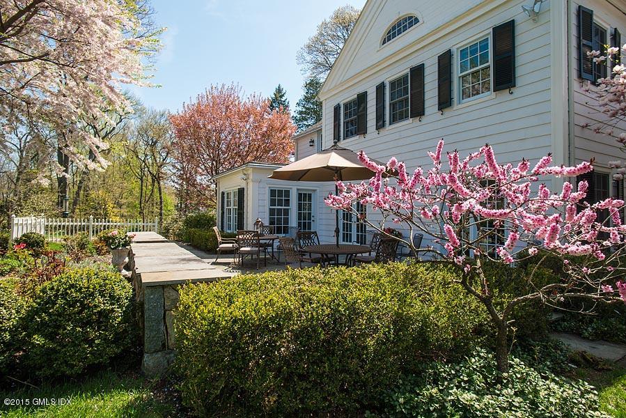 15 Owenoke Way Riverside, CT 06878 - Photo 18 of 22 a view of a house with sitting area and garden