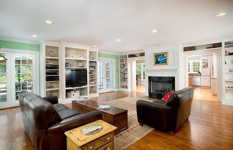 15 Owenoke Way Riverside, CT 06878 - Photo 7 of 22 a living room with furniture window and a fireplace