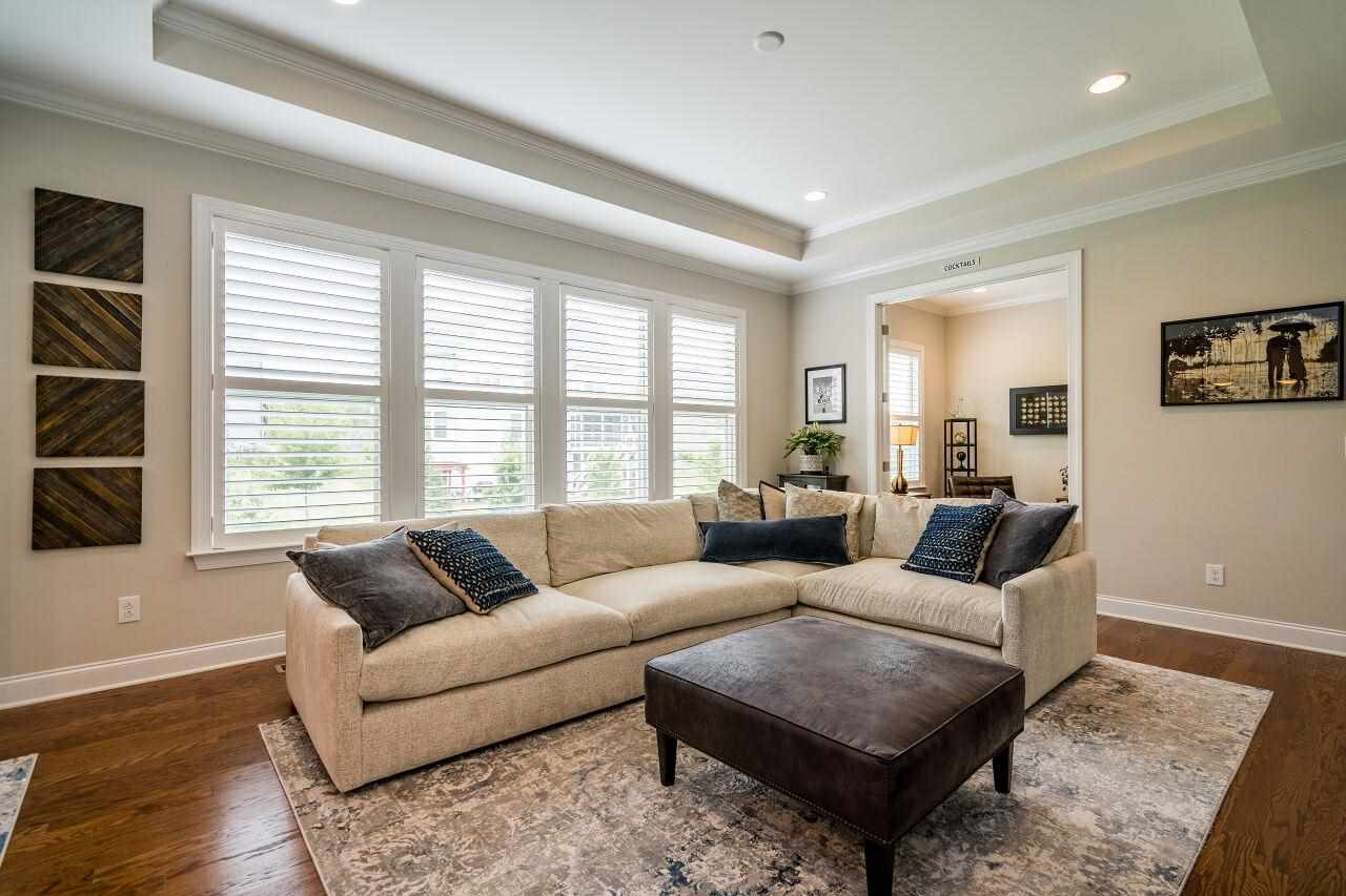 5268 Aleppo Lane Raleigh, NC 27613 - Photo 10 of 30 Recessed lighting with tray ceiling create ambiance in this open living room! Living Room