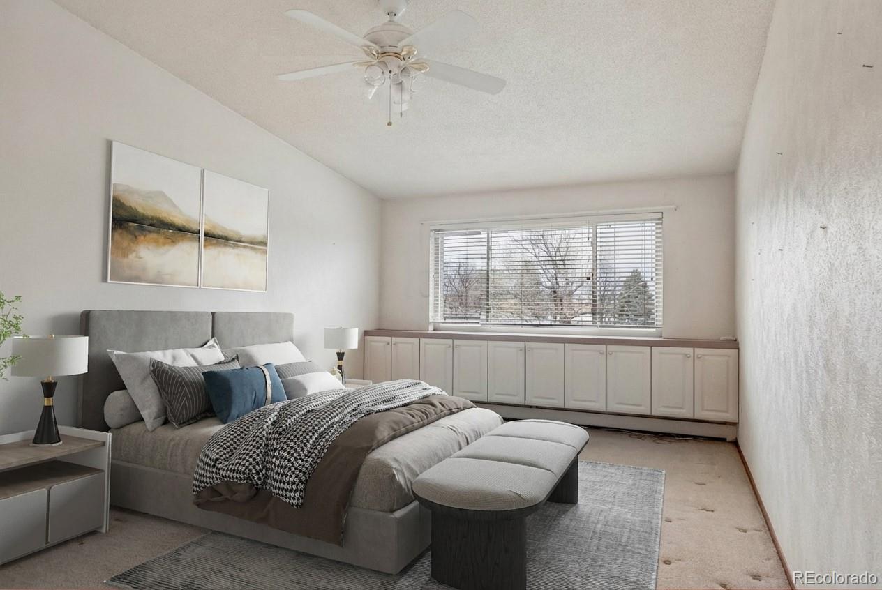 650 South Clinton Street, Unit 5D Denver, CO 80247 - Photo 11 of 48 a bed room with a bed and a window