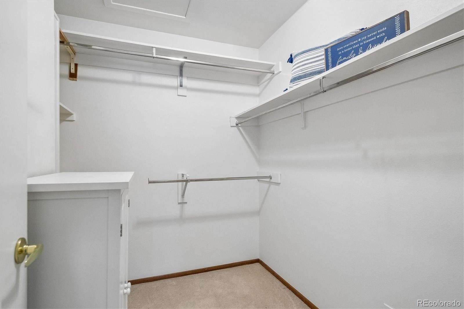 650 South Clinton Street, Unit 5D Denver, CO 80247 - Photo 14 of 48 a view of an empty walk in closet