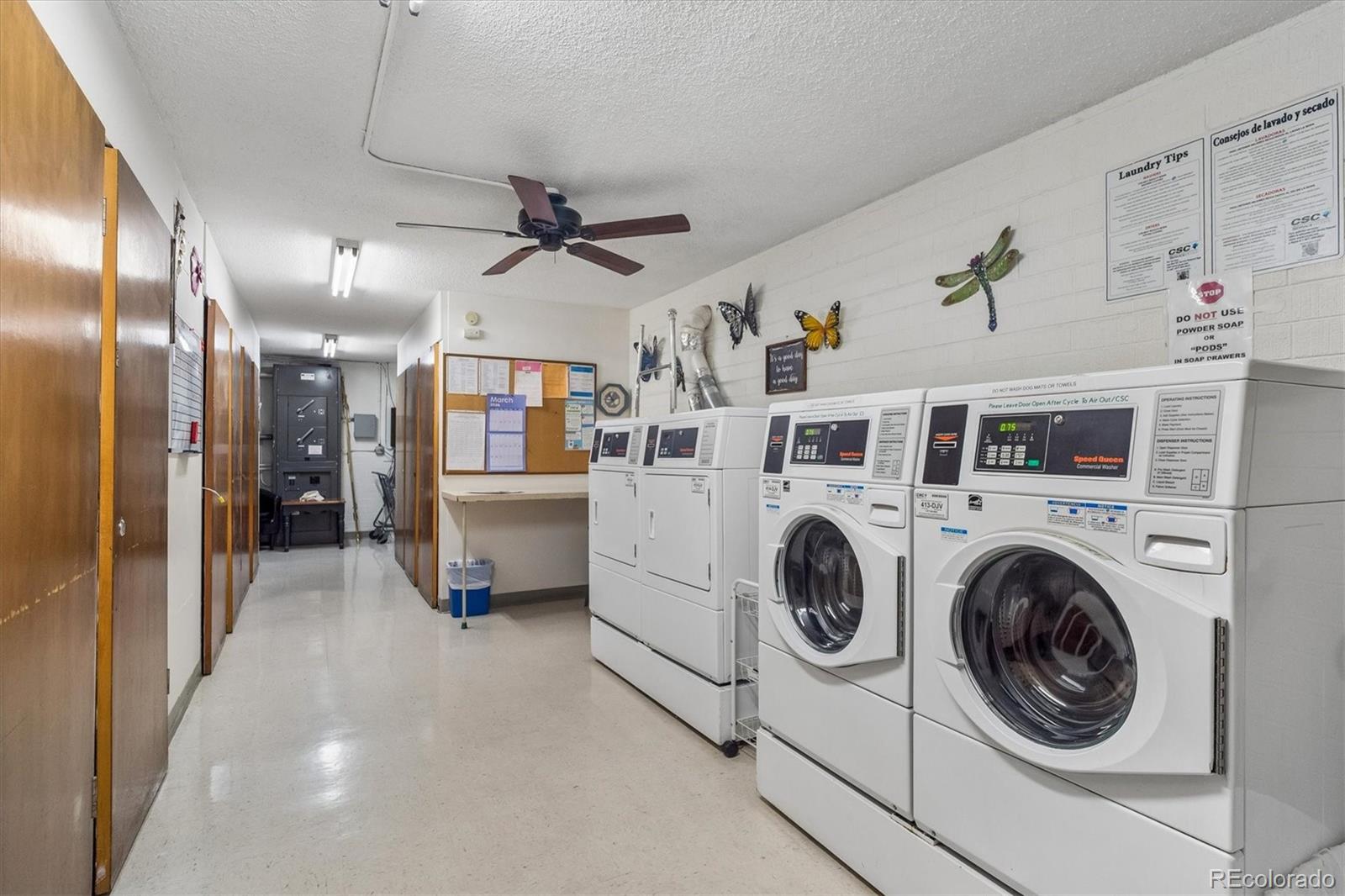 650 South Clinton Street, Unit 5D Denver, CO 80247 - Photo 20 of 48 a view of a hallway with washer and dryer