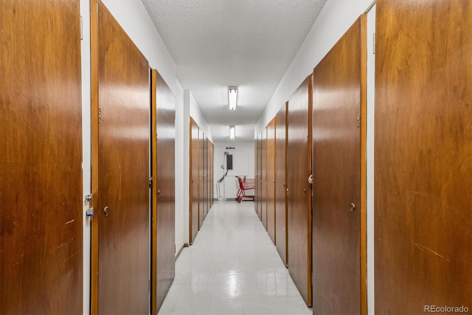 650 South Clinton Street, Unit 5D Denver, CO 80247 - Photo 21 of 48 a view of a hallway with chairs