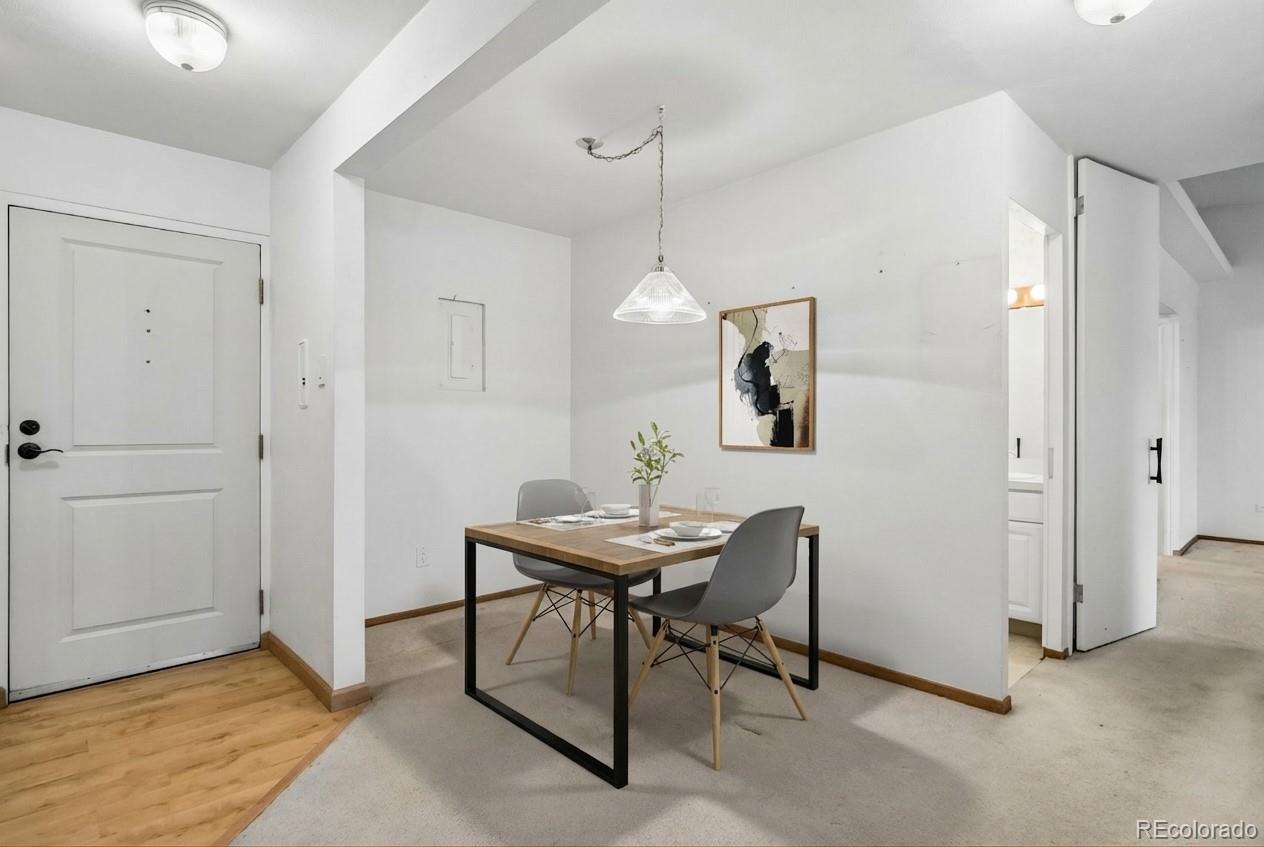 650 South Clinton Street, Unit 5D Denver, CO 80247 - Photo 5 of 48 a dining room with furniture and window