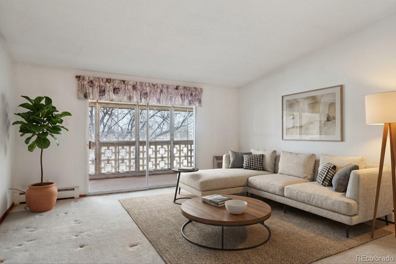 650 South Clinton Street, Unit 5D Denver, CO 80247 - Photo 7 of 48 a living room with furniture and a potted plant