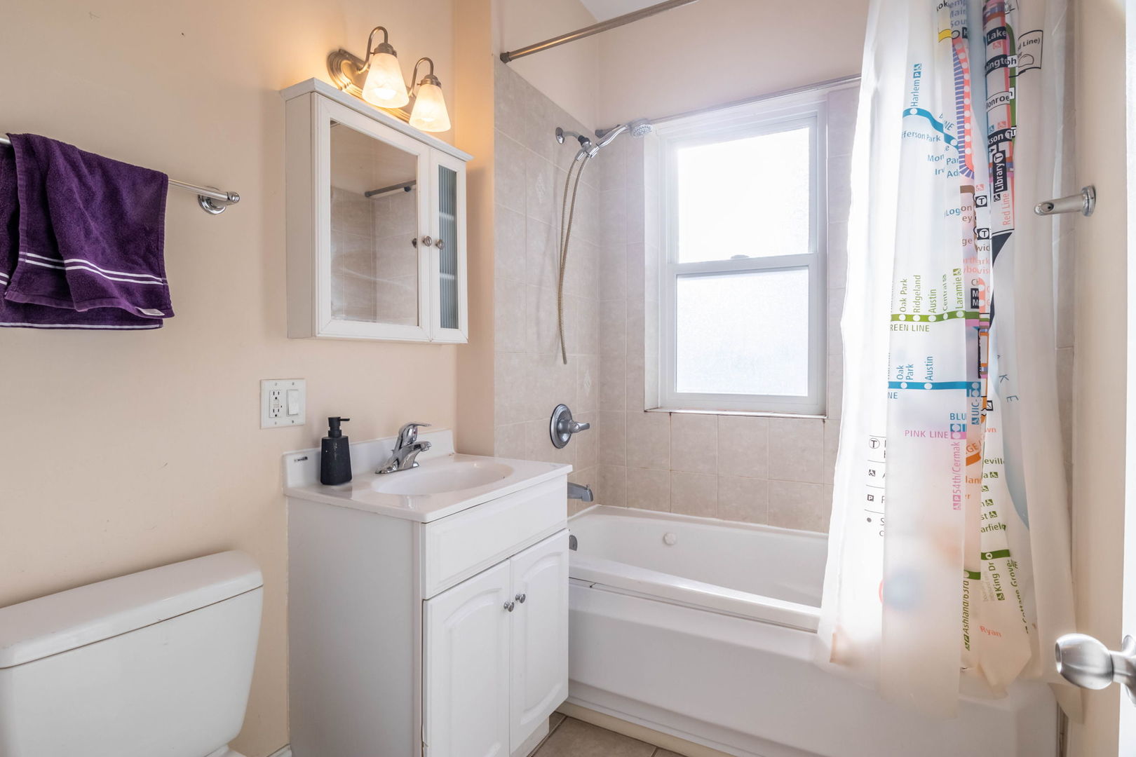 3737 North Pulaski Road, Unit 3S Chicago, IL 60641 - Photo 21 of 25 a bathroom with a sink a toilet and a bathtub