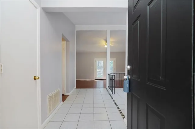 a view of a hallway with a furniture