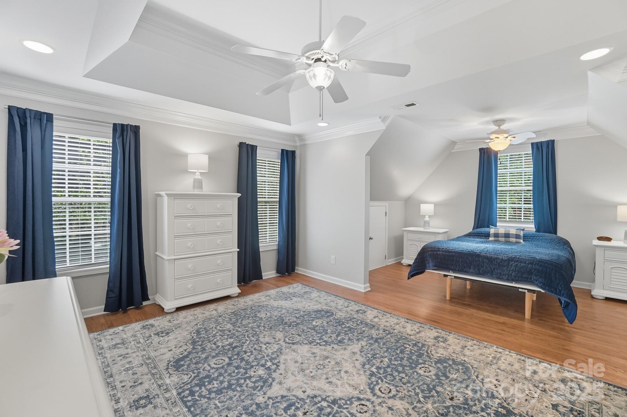 11177 Watertrace Drive Tega Cay, SC 29708 - Photo 14 of 28 a bedroom with furniture and window
