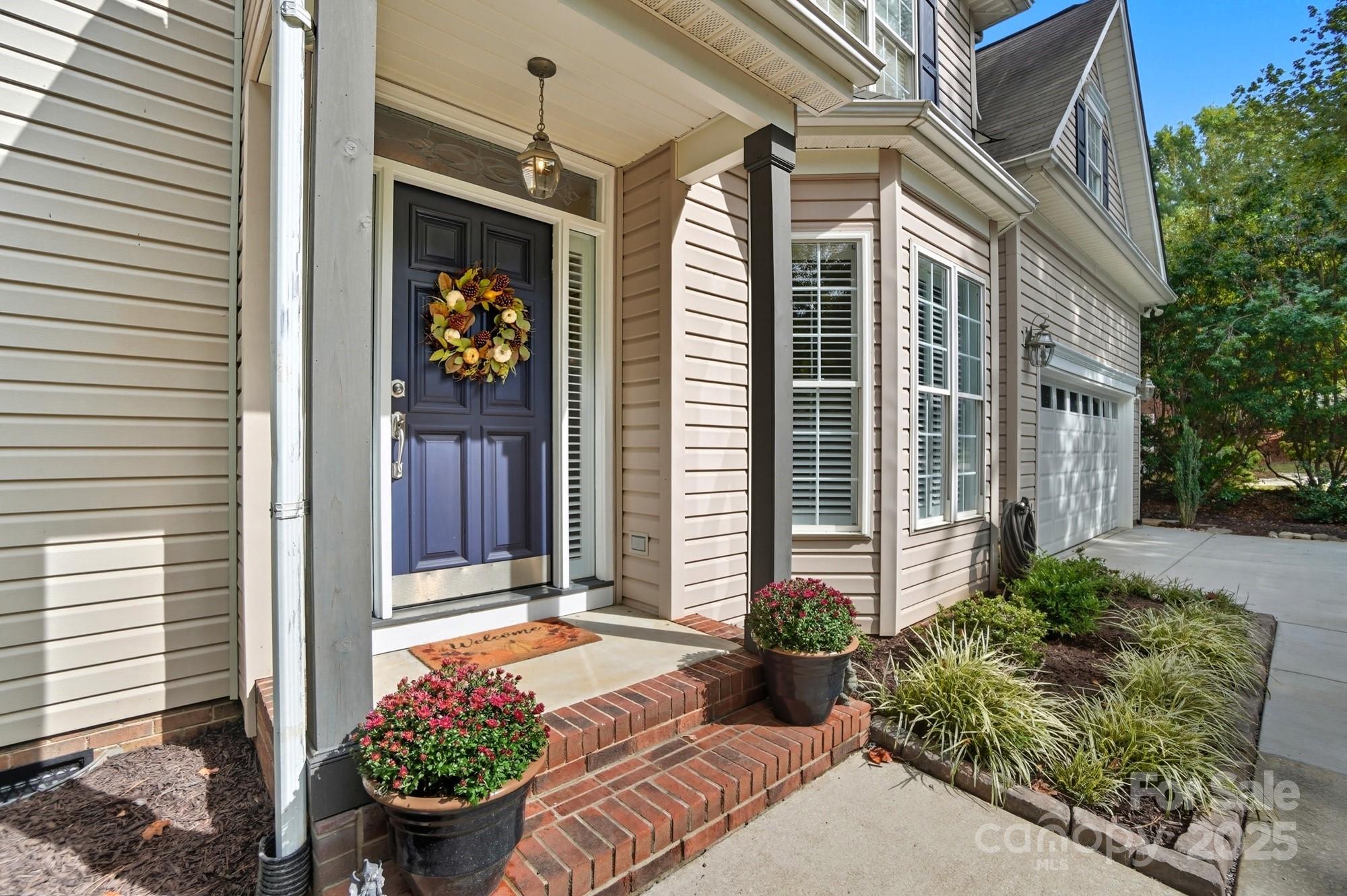 11177 Watertrace Drive Tega Cay, SC 29708 - Photo 2 of 28 a front view of a house