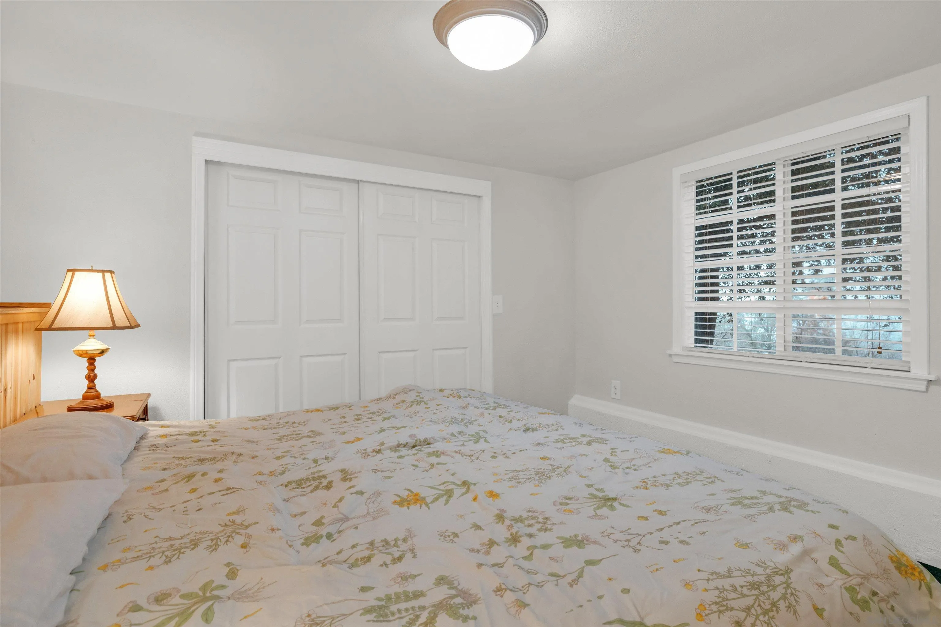 17009 Iron Springs Road Julian, CA 92036 - Photo 38 of 70 a bedroom with a bed and a window