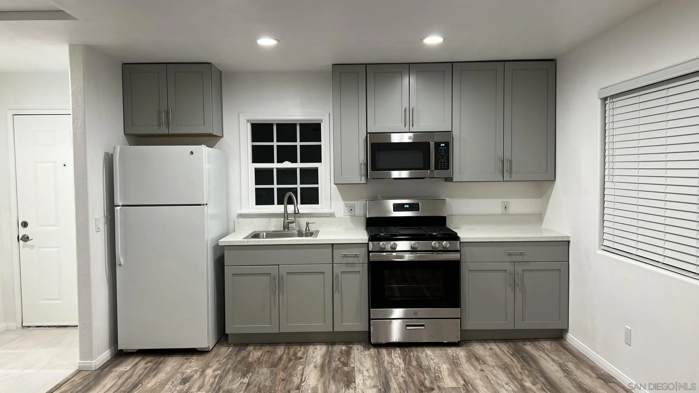 17009 Iron Springs Road Julian, CA 92036 - Photo 51 of 70 a kitchen with stainless steel appliances a stove sink and refrigerator