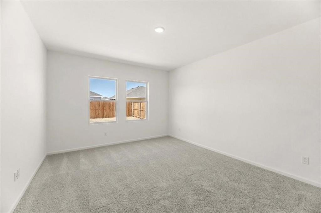 10308 Holy Cross Lane Crowley, TX 76036 - Photo 19 of 27 an empty room with a window