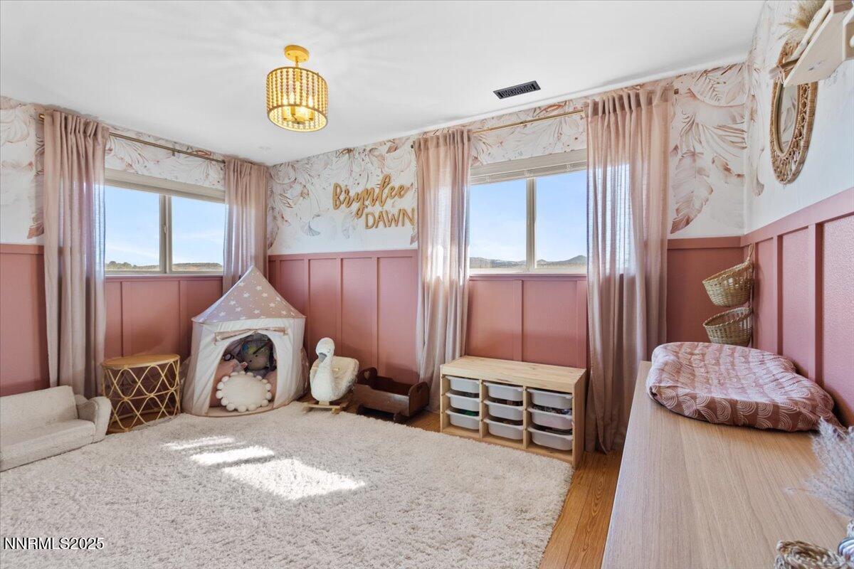 2371 Enterprise Road Reno, NV 89521 - Photo 9 of 25 a bedroom with bed and window