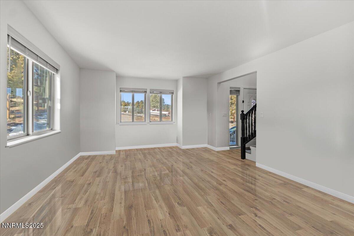 2371 Enterprise Road Reno, NV 89521 - Photo 10 of 25 an empty room with windows and closet