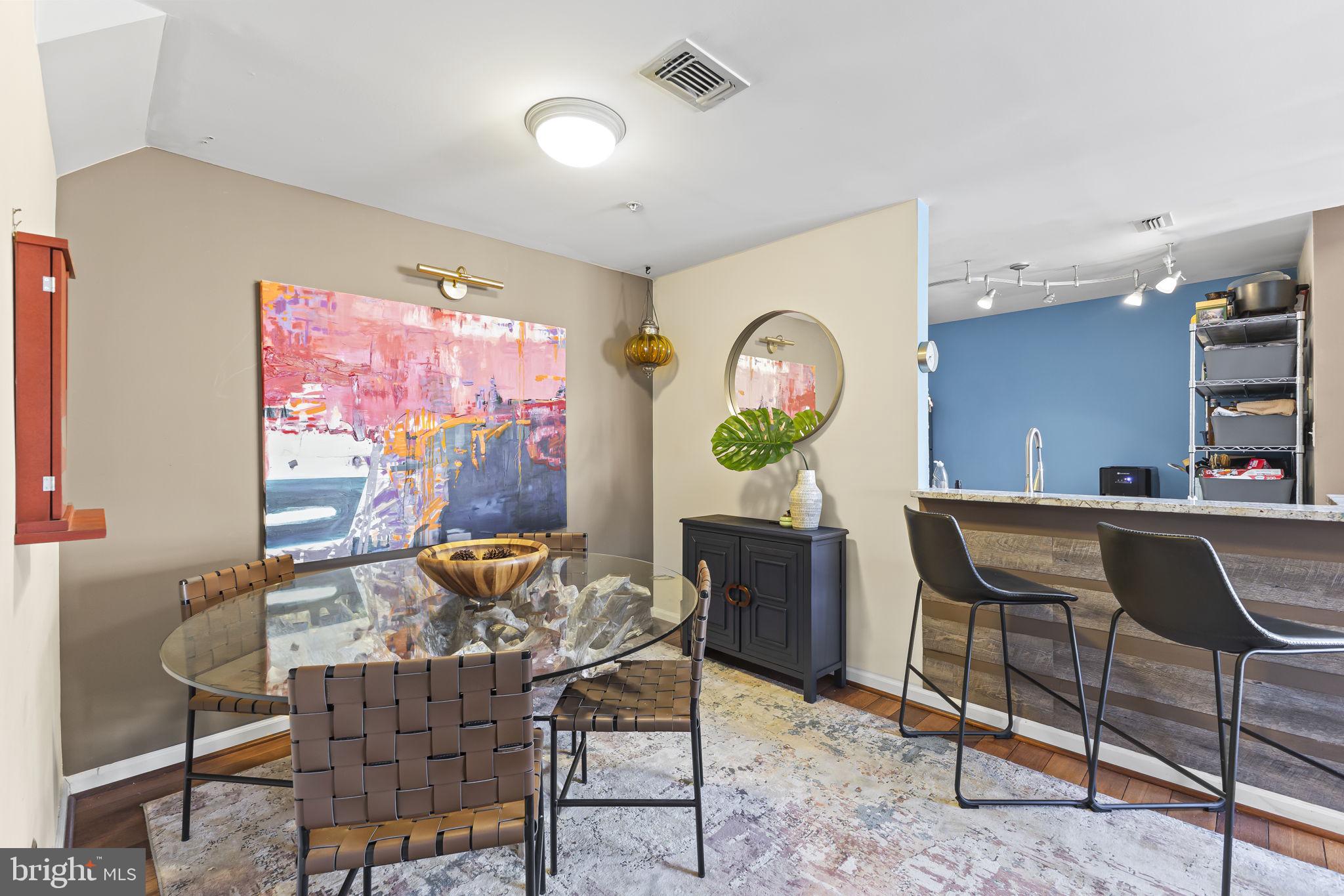 2320 Falls Gable Lane, Unit B Baltimore, MD 21209 - Photo 7 of 26 a view of a dining room with furniture
