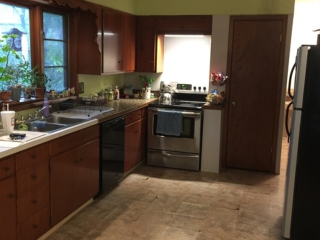 5N135 Powis Road Wayne, IL 60184 - Photo 2 of 13 a kitchen with stainless steel appliances granite countertop a refrigerator and a sink