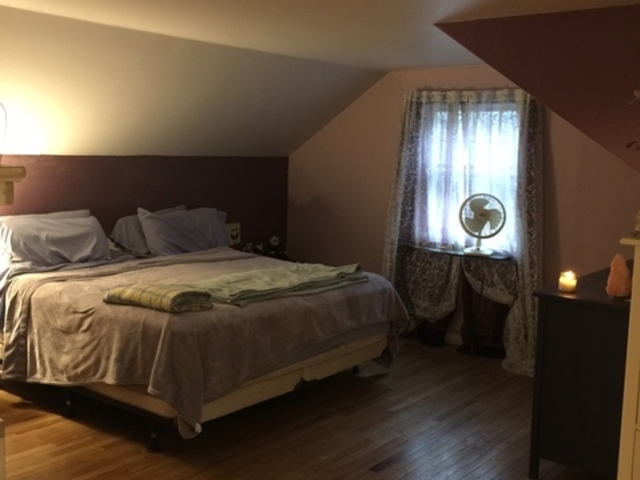 5N135 Powis Road Wayne, IL 60184 - Photo 8 of 13 a bedroom with a bed and a lamp on dresser