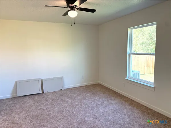 an empty room with a window