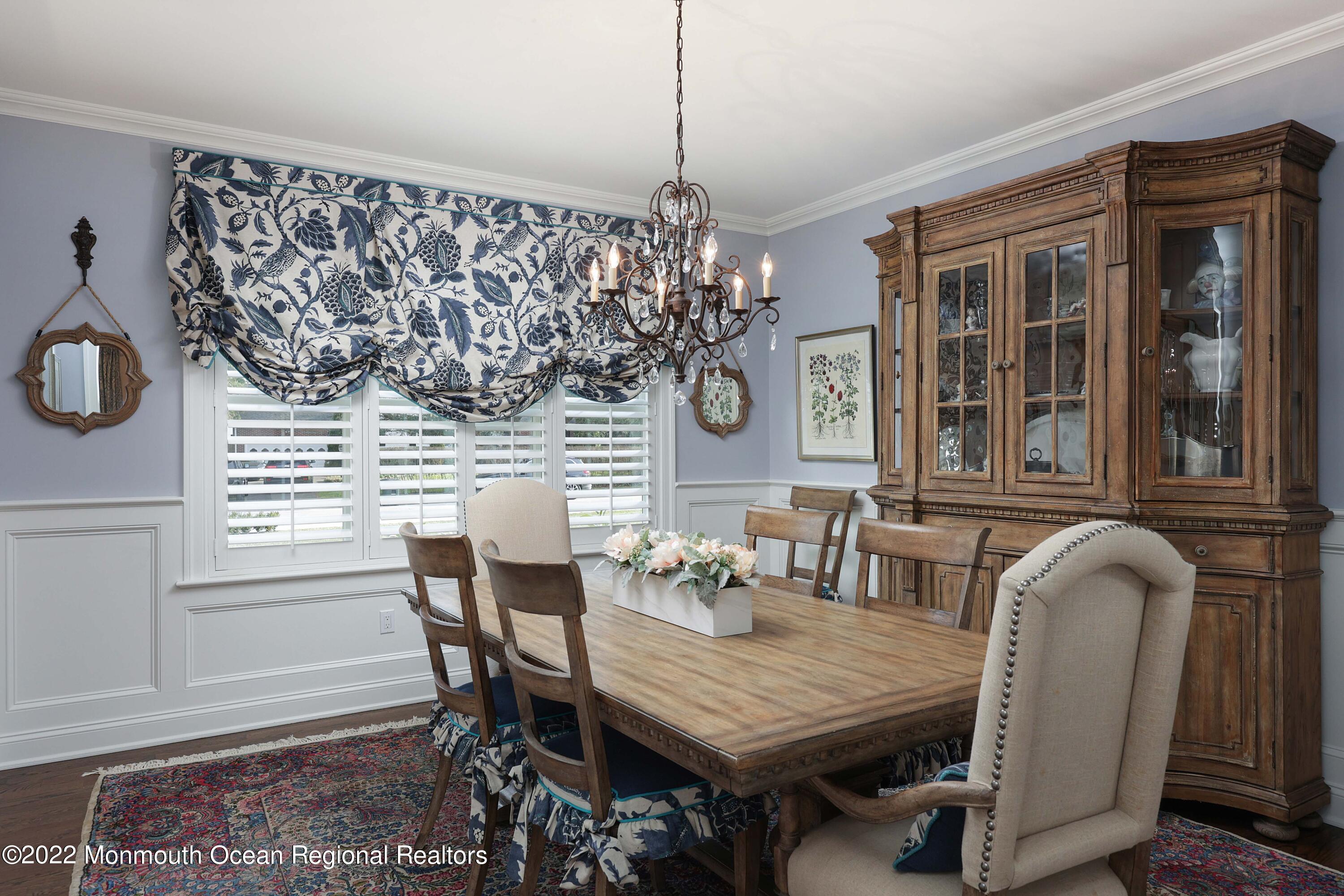 47 Shadowbrook Road Shrewsbury, NJ 07702 - Photo 11 of 39 a dining room with furniture a chandelier and window