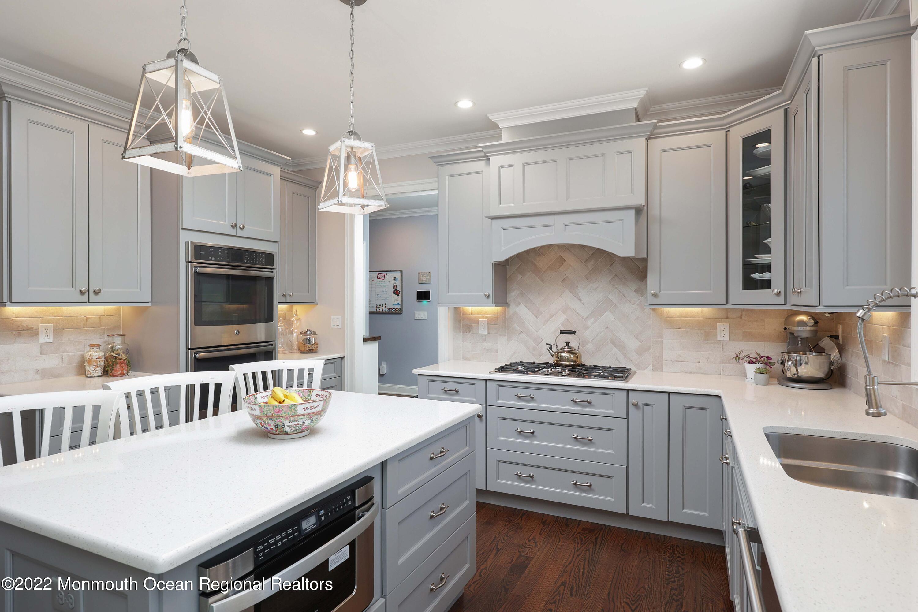 47 Shadowbrook Road Shrewsbury, NJ 07702 - Photo 18 of 39 a kitchen that has a lot of cabinets in it
