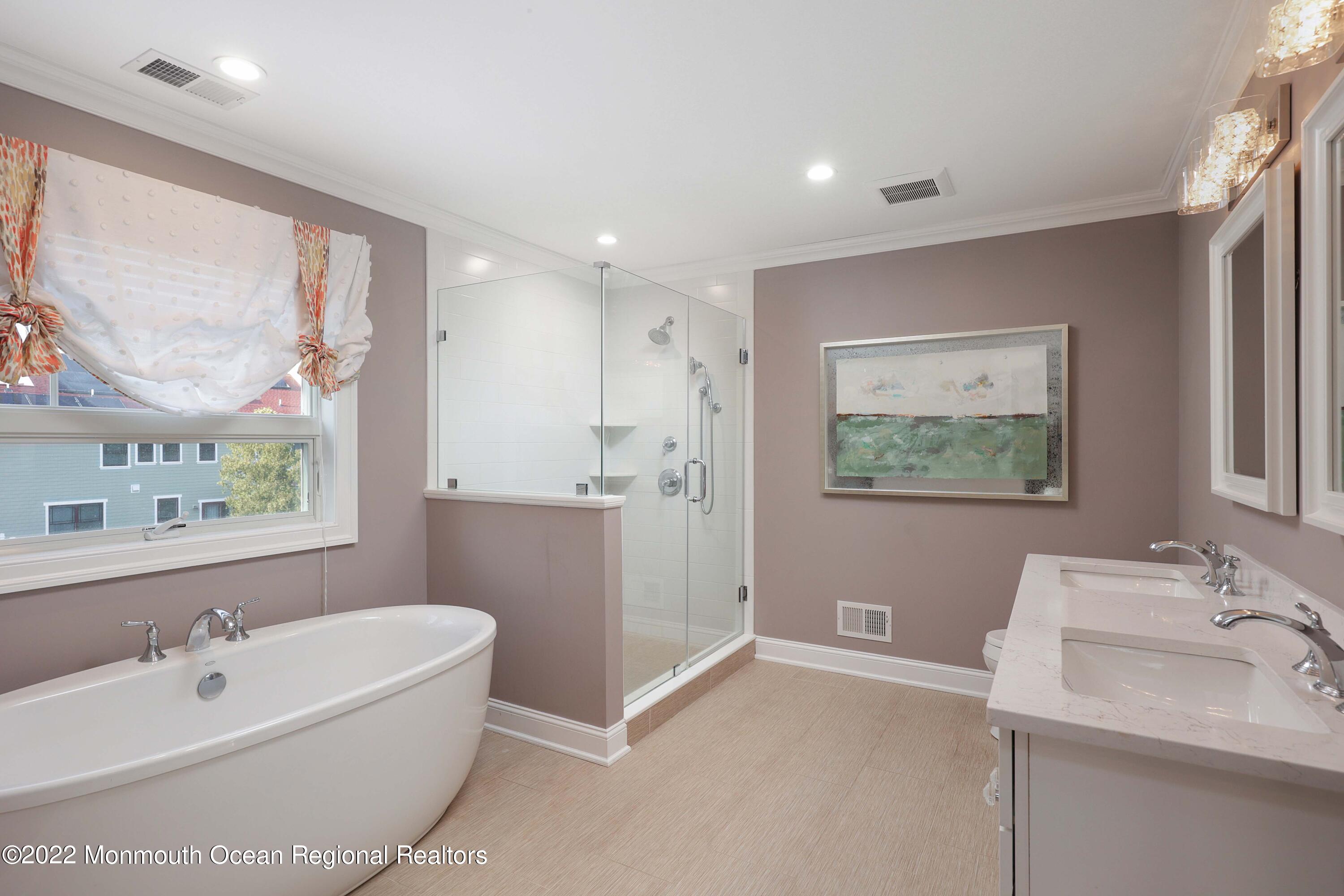 47 Shadowbrook Road Shrewsbury, NJ 07702 - Photo 21 of 39 a bathroom with a bathtub and a sink