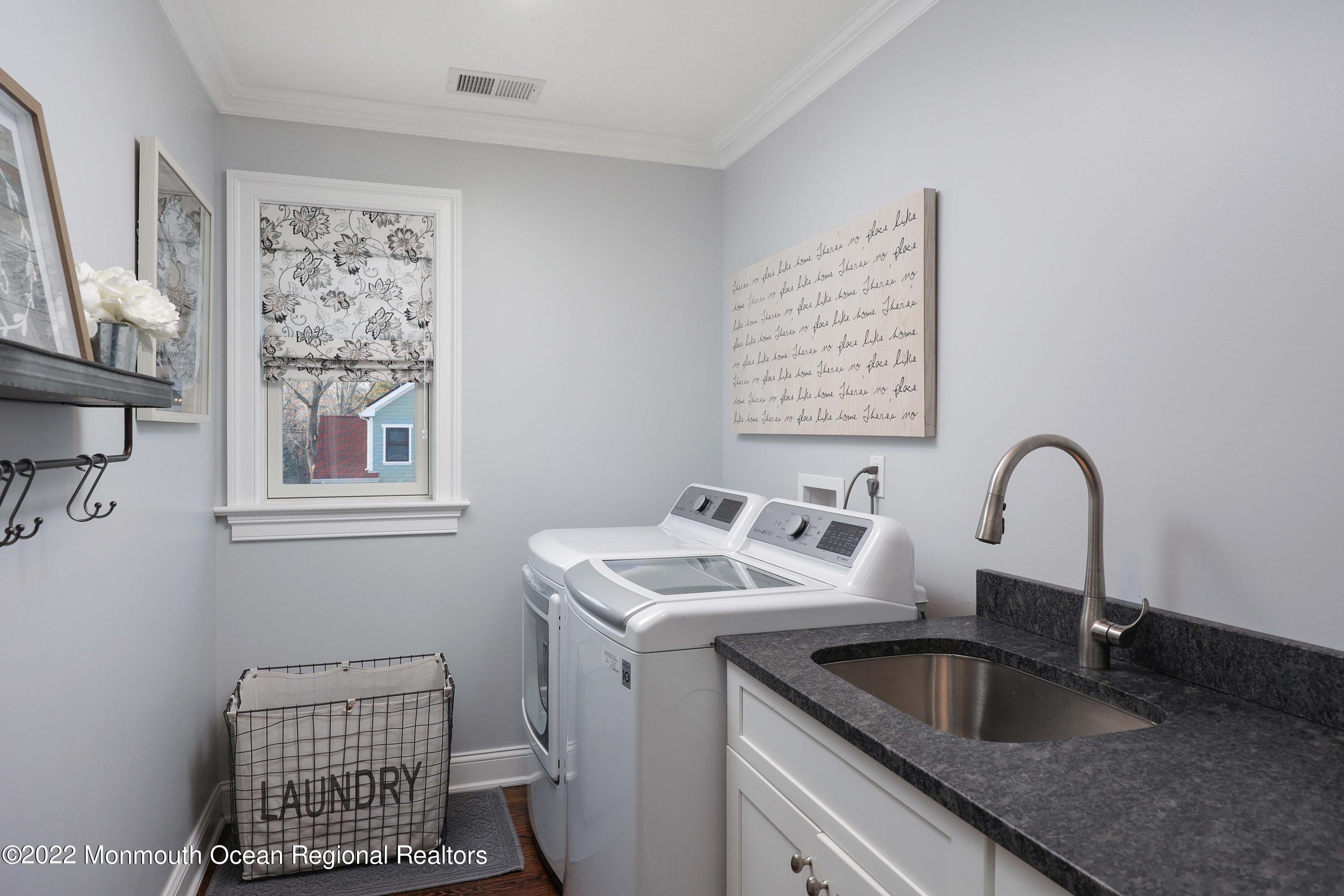 47 Shadowbrook Road Shrewsbury, NJ 07702 - Photo 27 of 39 a kitchen with a sink and a stove top oven