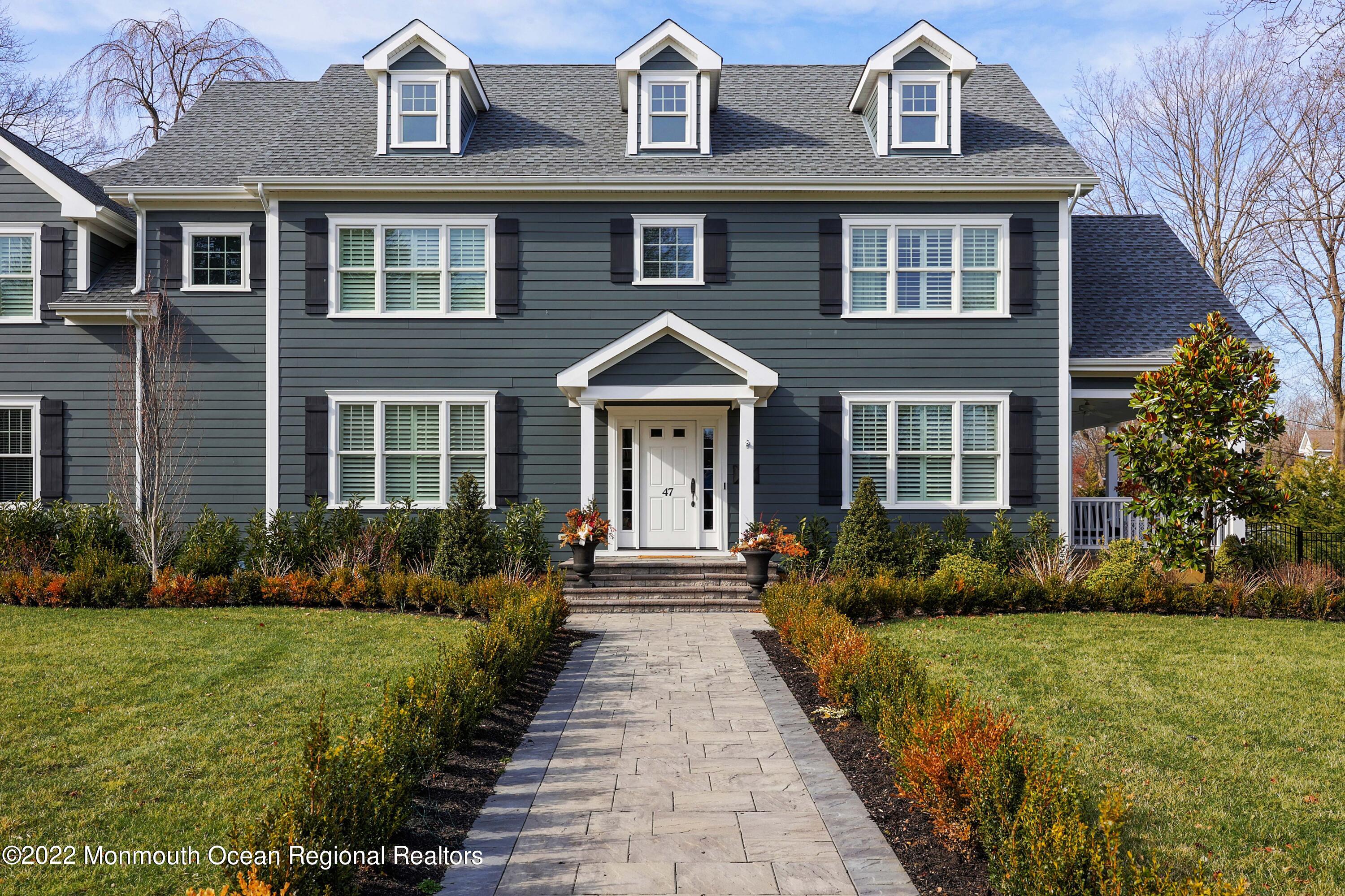 47 Shadowbrook Road Shrewsbury, NJ 07702 - Photo 4 of 39 a front view of a house with garden