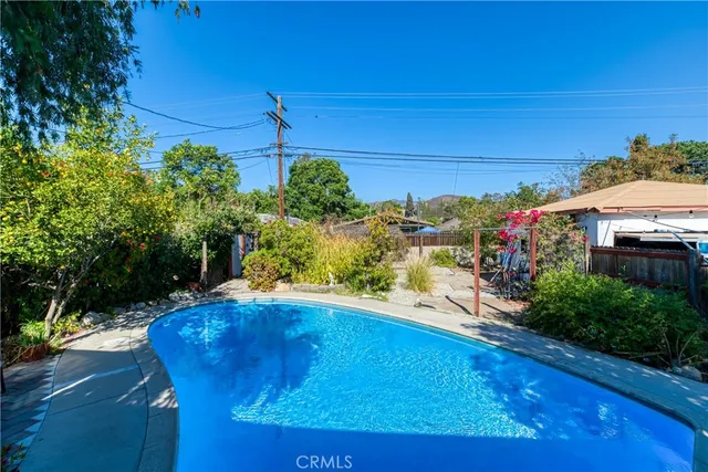 a view of a yard with an outdoor space