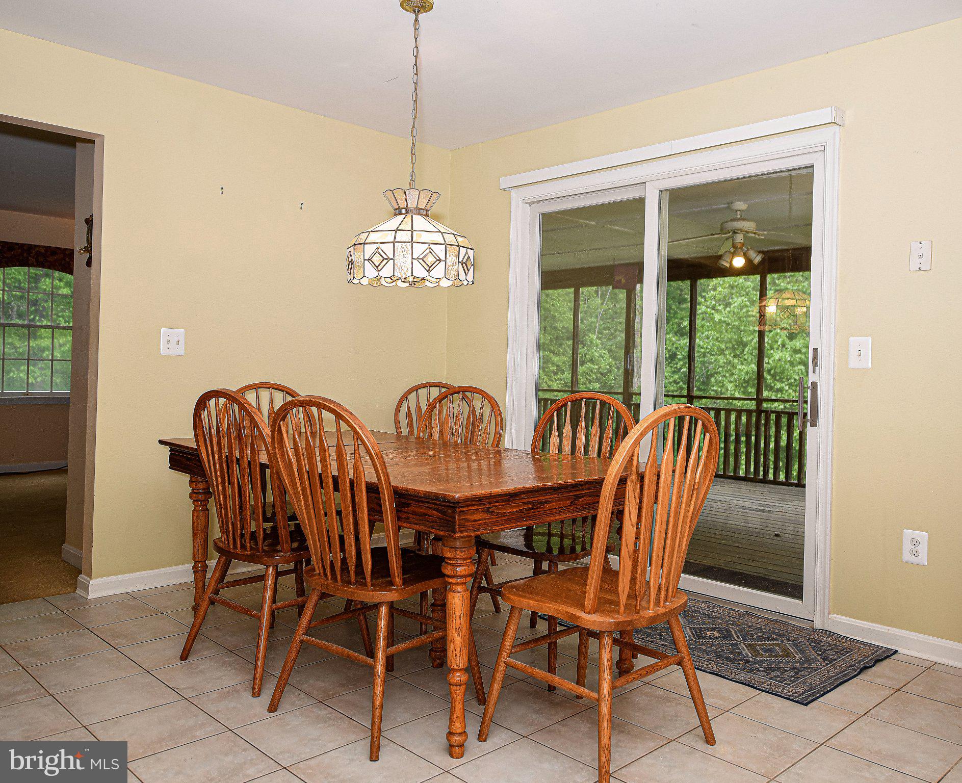 711 Gilbert Road Aberdeen, MD 21001 - Photo 7 of 54 a view of a dining room with furniture window and outside view