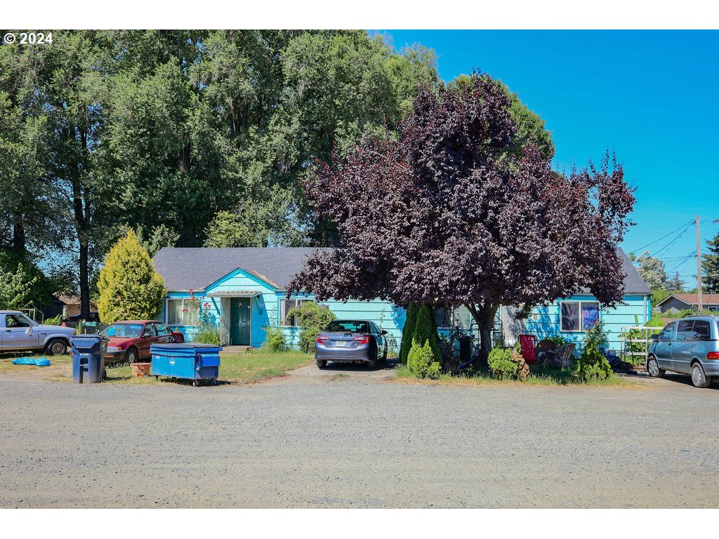 a childrens park with lots of swings and slides