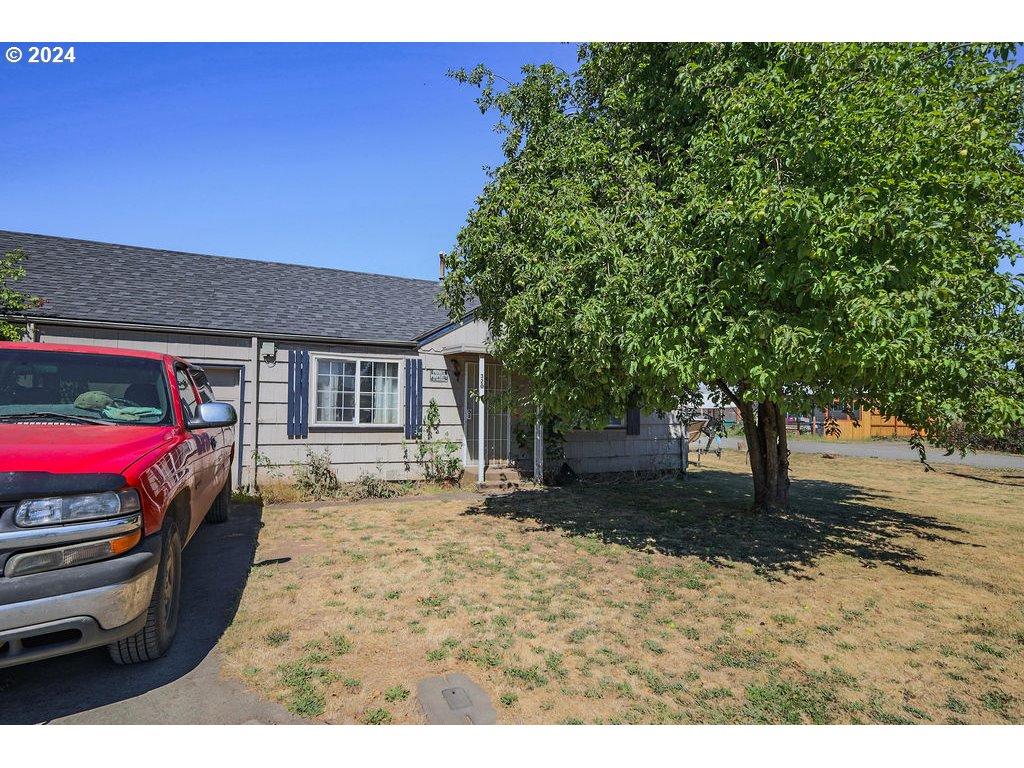 280 North Seneca Road Eugene, OR 97402 - Photo 7 of 10 a view of a house with a yard