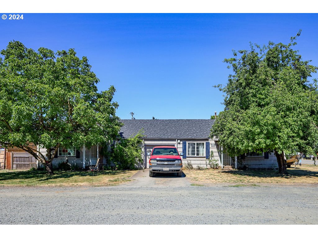 280 North Seneca Road Eugene, OR 97402 - Photo 10 of 10 a car parked in front of a building