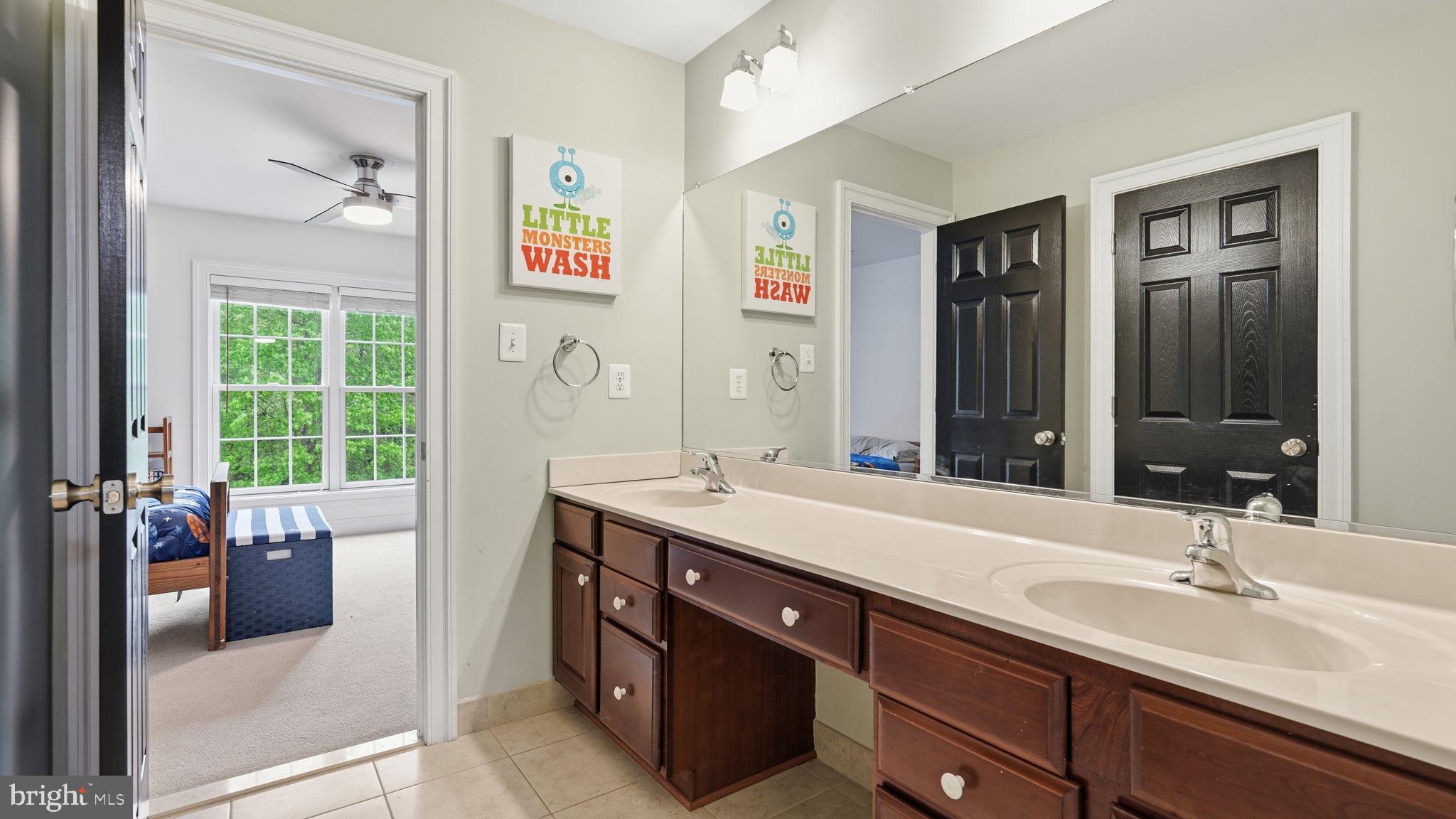 15613 Thoroughfare Road Gainesville, VA 20155 - Photo 38 of 64 Bright and cheerful bathroom retreat.
