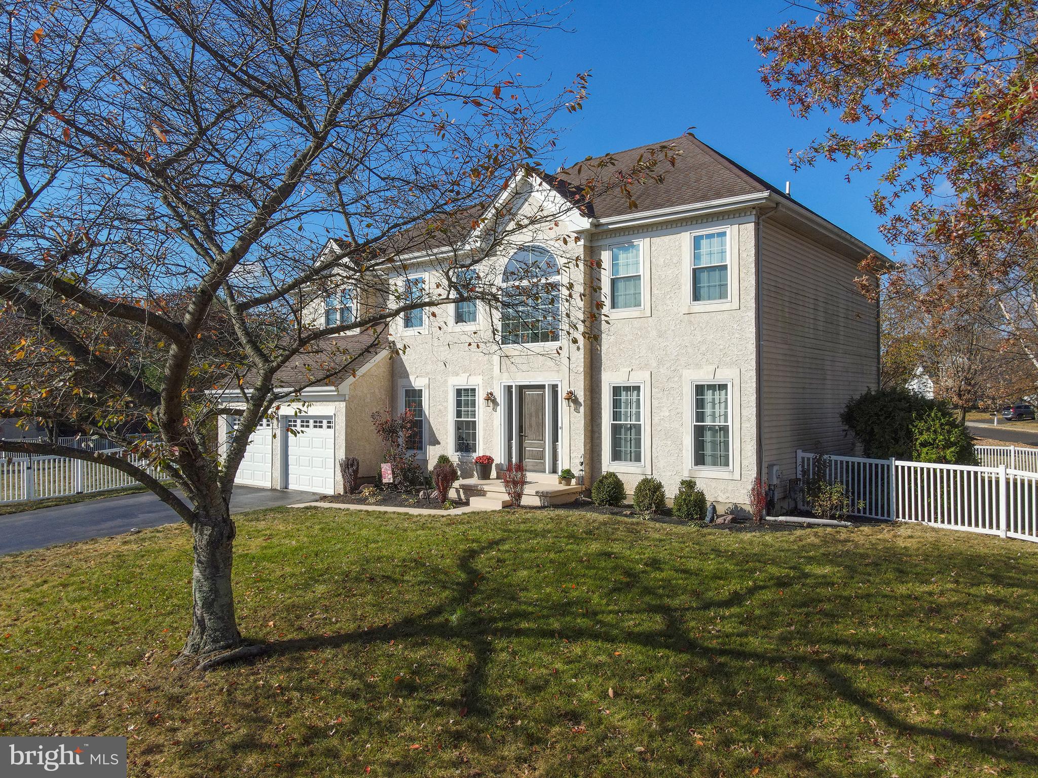 4909 Stillwater Circle Doylestown, PA 18902 - Photo 1 of 70 a front view of a house with garden