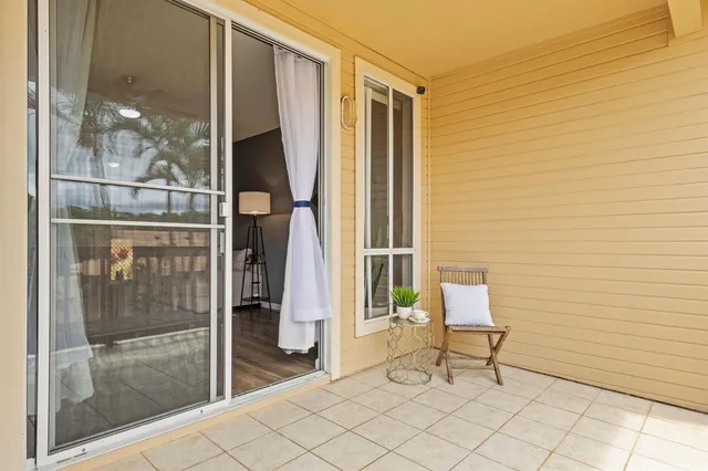 a view of a living room and entry way