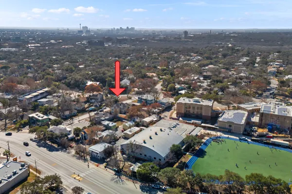 an aerial view of a city with lots of residential buildings