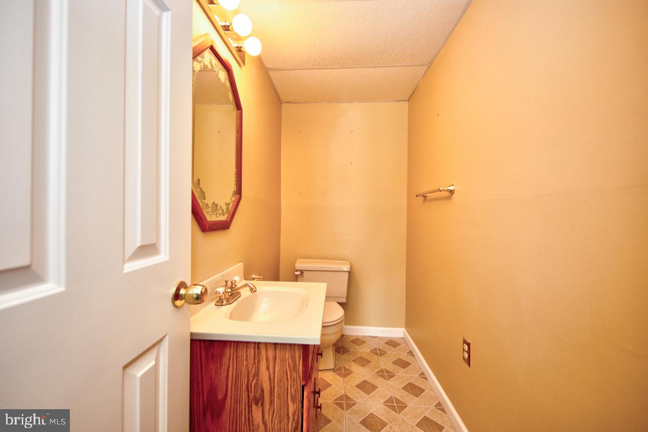 2301 Maple Road Baltimore, MD 21219 - Photo 27 of 28 1/2 bathroom on lower level