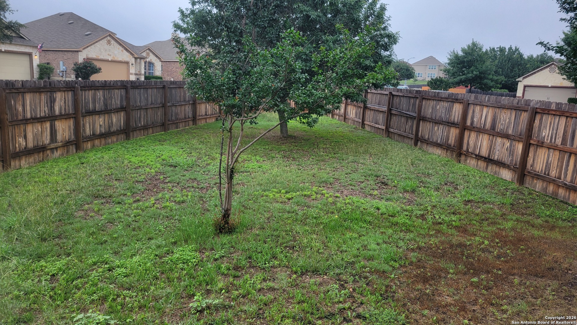 26311 Presidio Boerne, TX 78015 - Photo 16 of 16 a view of a backyard with a fence